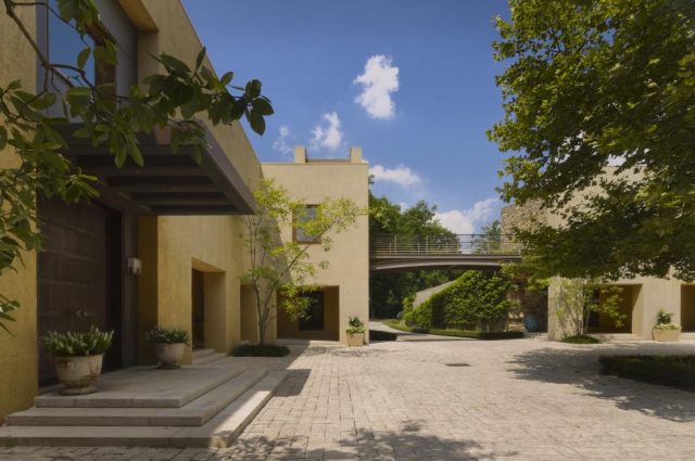 20,000-Square Foot Playhouse & Indoor Tennis Court!