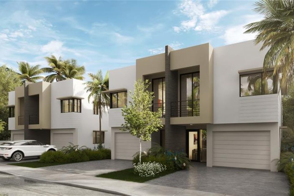 driveways and foliage surrounding oaks place town homes