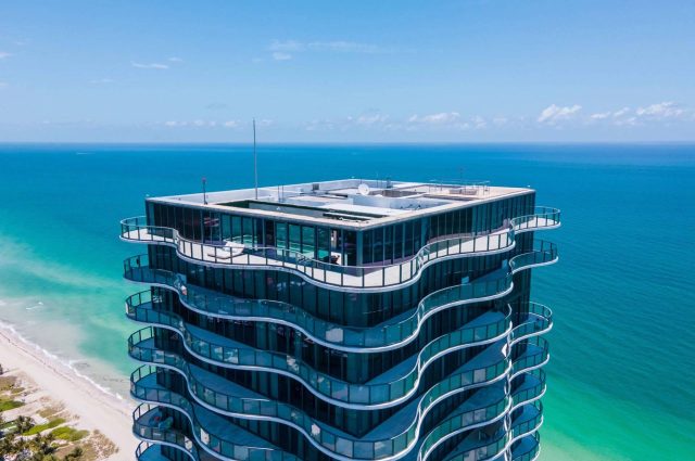 South Florida’s Quirky Motel Row Is Now Expensive Condos & Penthouses – One Is Going To Auction!