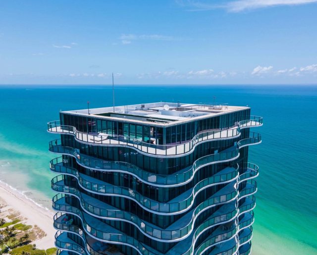 South Florida’s Quirky Motel Row Is Now Expensive Condos & Penthouses – One Is Going To Auction!